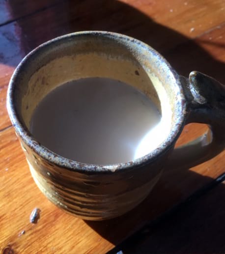 mullein infusion with milk and maple syrup in a mug